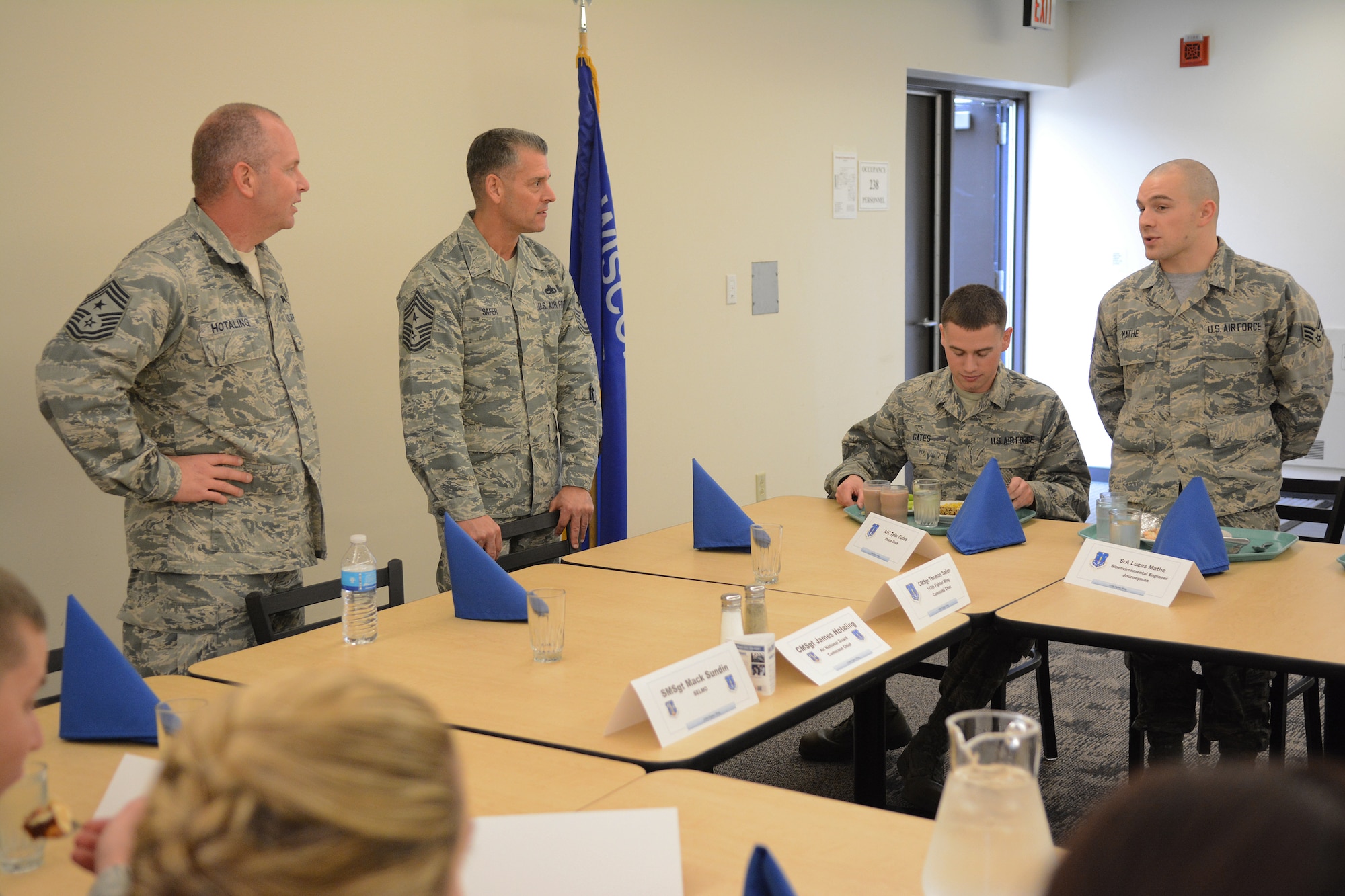 Chief Master Sgt. James W. Hotaling, Air National Guard command chief, joins Airmen of the 115th Fighter Wing for lunch in Madison, Wis., Dec. 6, 2015. The luncheon gave selected Airmen a chance to meet and discuss various topics with Hotaling. (U.S. Air National Guard photo by Senior Airman Kyle P. Russell)