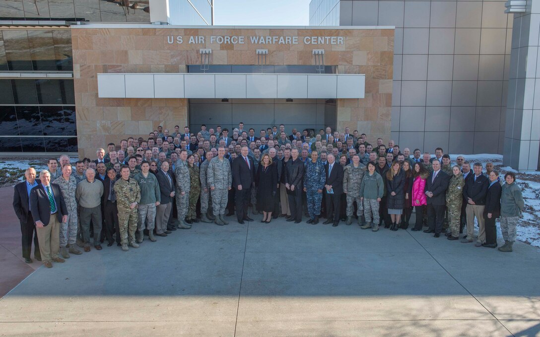 Deputy Defense Secretary Bob Work takes a group photo with Schriever Wargame participants on Schriever Air Force Base, Colo., Dec. 17, 2015. DoD photo by Navy Petty Officer 1st Class Tim D. Godbee