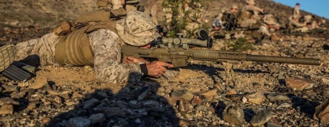 A Marine with 1st Battalion, 8th Marine Regiment fires rounds during the sniper marksmanship assessment as part of Integrated Training Exercise 1-16 aboard Marine Air Ground Combat Center, Twentynine Palms, Calif., Oct. 24, 2015. During ITX, Marines demonstrate core infantry mission essential tasks while conducting offensive and defensive stability operations. (U.S. Marine Corps photo by Cpl. Immanuel M. Johnson/Released)