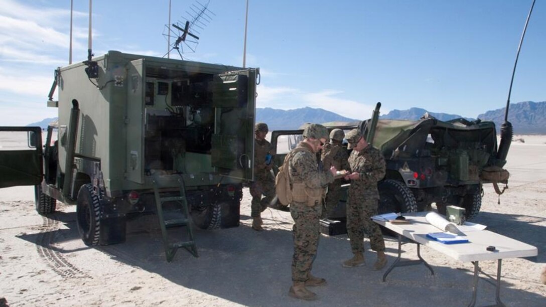 High Mobility Artillery Rocket System crewmen assigned to Battery D, 2nd Battalion, 14th Marine Regiment, prepare their launcher for live-fire operations after debarking a KC-130J aircraft, supporting their raid operations at White Sands Missile Range, New Mexico, Dec. 4, 2015. “We were essentially trying to test the capability of the HIMARS to launch an air raid from any position,” said Sgt. Garrett S. Zurich, HIMARS launcher section chief, 1st platoon, Battery D.