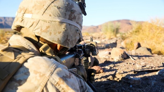 A Marine with Charlie Company, 1st Battalion, 8th Marine Regiment sights in during the defensive phase of the Battalion Assault Course, the culminating event for Integrated Training Exercise 1-16 aboard Marine Corps Air Ground Combat Center, Twentynine Palms, Calif., Nov. 6, 2015. The BAC assessed a battalion’s ability to conduct offensive and defensive operations integrating elements from the Air Combat Element and Logistics Combat Element. 