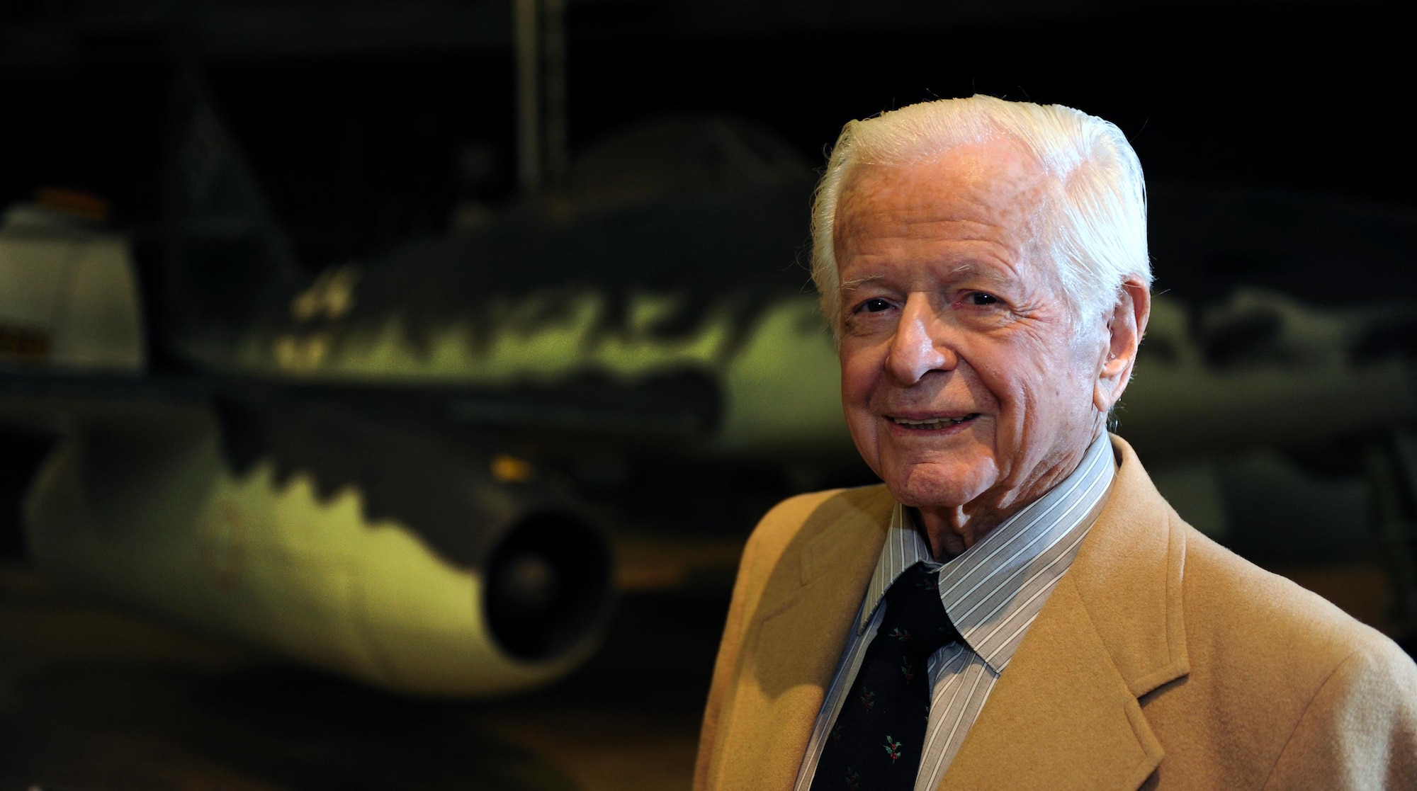 Victor Bilek, a National Air and Space Intelligence Center alum, stands in front of the German Messerschmitt Me 262 Schwalbe Wednesday, Dec. 9, 2015 at the National Air Force Museum. He worked on the exploitation of the plane's armament systems during WWII. At 97 years old, Bilek is the oldest living NASIC alum. He recently came to the Center to share his war stories with today's generation of Airmen. (U.S. Air Force photo by Tech. Sgt. Raymond Hoy)