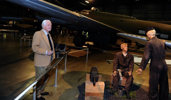 Victor Bilek, a retired National Air and Space Intelligence Center Airman, stands in front of the German MK-108 cannon Messerschmitt Me 262 Schwalbe Wednesday, Dec. 9, 2015 at the National Air Force Museum. He researched the cannon for exploitation during WWII. At 97 years old, Bilek is the oldest living NASIC alum. He recently came to the Center to share his war stories with today's generation of Airmen. (U.S. Air Force photo by Tech. Sgt. Raymond Hoy)