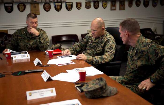 (left) BGen J.D. Alford, CG MCWL/FD, (center) Gen Robert Neller, CMC, and (right) LtGen Robert Walsh, CG MCCDC talk about the Marine Corps' current plan for wargaming and considerations for the future.