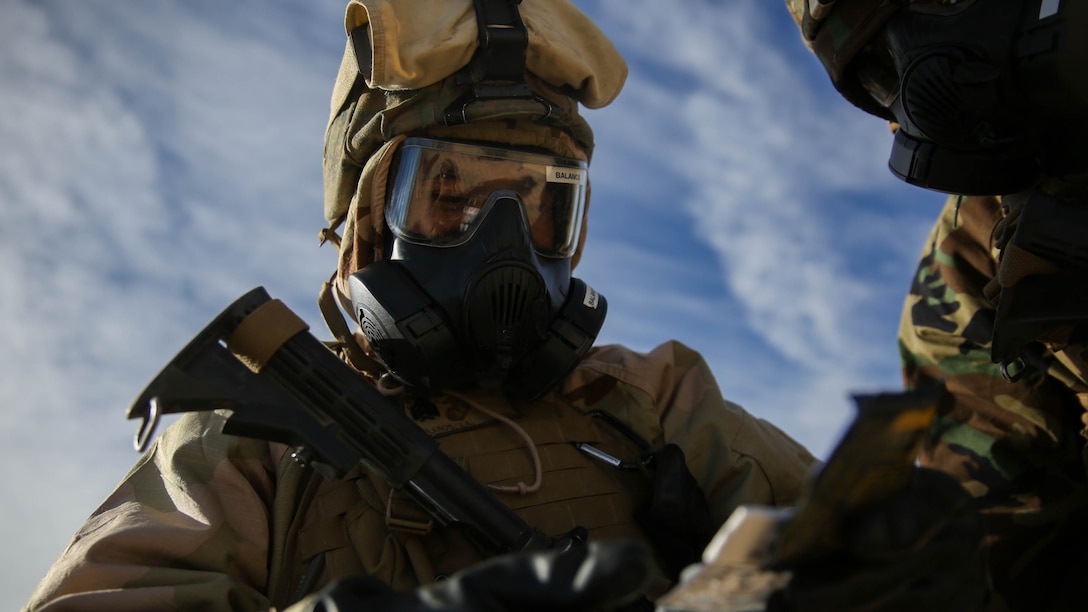Sergeant Jacob Balancos, a radio operator with 5th Marine Regiment, 1st Marine Division, holds tablets to test the air for harmful chemical agents during a CBRN drill aboard Marine Corps Air Ground Combat Center Twentynine Palms, California, Dec. 13, 2015. The Marines and Sailors with 5th Marine Regiment conducted the gas drill as part of Steel Knight 2016, a division-led exercise which prepares Marines and Sailors with the 1st Marine Division and adjacent I Marine Expeditionary Force units with the skill sets necessary to operate as a fully capable Marine Air Ground Task Force.  