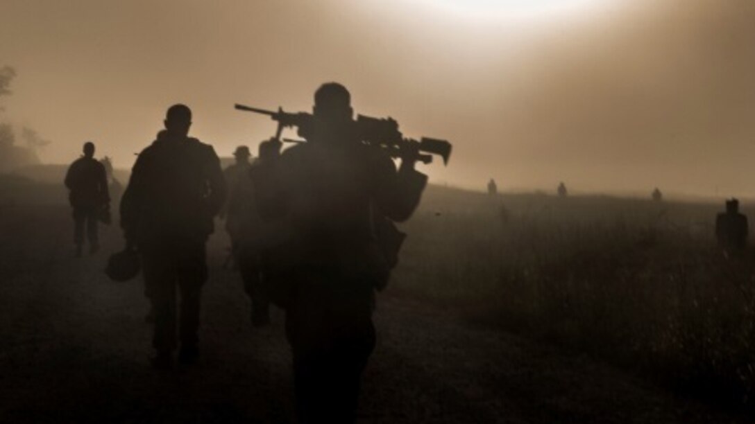 Marines with 1st Battalion, 8th Marine Regiment make their way up to their firing position during a company live-fire exercise at Marine Corps Bae Camp Lejeune, N.C., Sept. 30, 2015. The exercise is in preparation for the integrated training exercise taking place at Air-Ground Combat Center Twentynine Palms, Calif., in October.