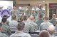 Chief Master Sgt. Cameron Kirksey, command chief of Air Force Reserve Command, addresses members of the 910th Security Forces Squadron during shift change here Dec. 6, 2015. Kirksey visited with 910th units over the December training weekend to address concerns of enlisted personnel as well as to assess the overall morale of the enlisted ranks serving on the base. (U.S. Air Force photo/Tech. Sgt. James Brock)