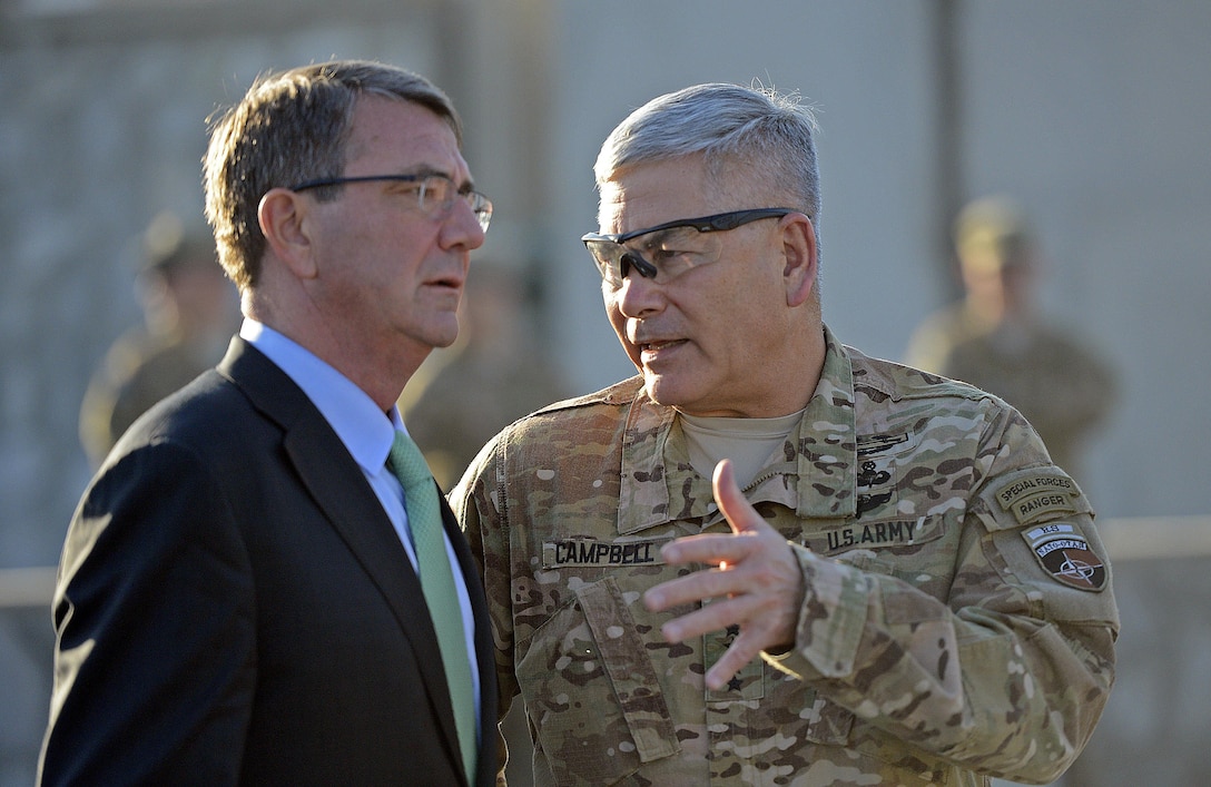 U.S. Defense Secretary Ash Carter speaks with U.S. Army Gen. John F. Campbell on Forward Operating Base Fenty in Jalalabad, Afghanistan, Dec. 18, 2015. U.S. Air Force photo by Staff Sgt. Tony Coronado