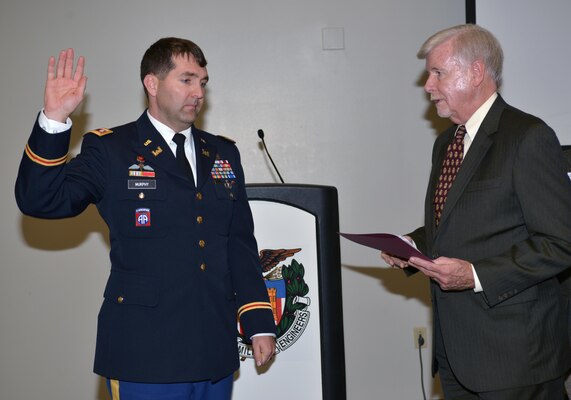 (Right) Society of American Military Engineers Nashville Post member John Hall, administers the oath of office to incoming SAME President Lt. Col. Stephen F. Murphy, Nashville District commander during an installation ceremony in the Tennessee Engineering Center at the Adventure Science Center.   
