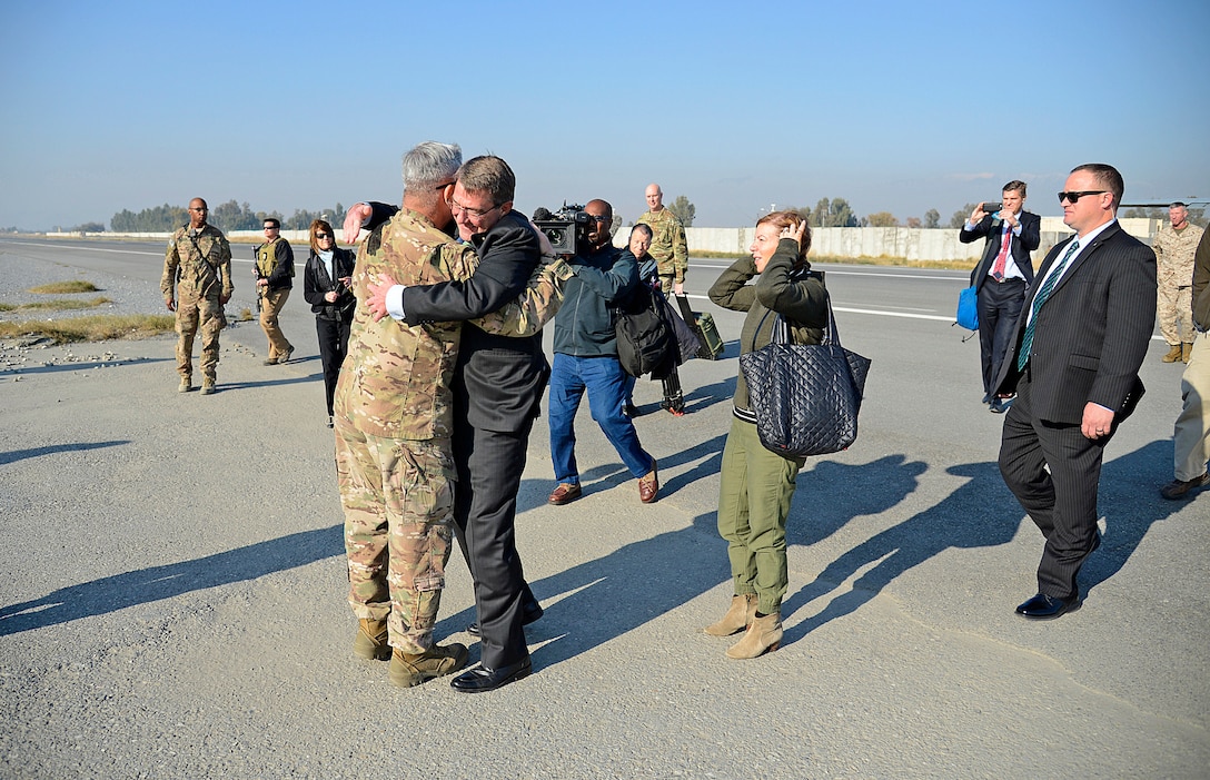 U.S. Army Gen. John F. Campbell, left front, commander of NATO’s Resolute Support mission and U.S. Forces – Afghanistan, greets U.S. Defense Secretary Ash Carter on Forward Operating Base Fenty in Jalalabad, Afghanistan, Dec. 18, 2015. Carter is on a weeklong trip to the Middle East to meet with defense leaders and thank U.S. and coalition troops for their service and sacrifice, especially during the holiday season. U.S. Air Force photo by Staff Sgt. Tony Coronado