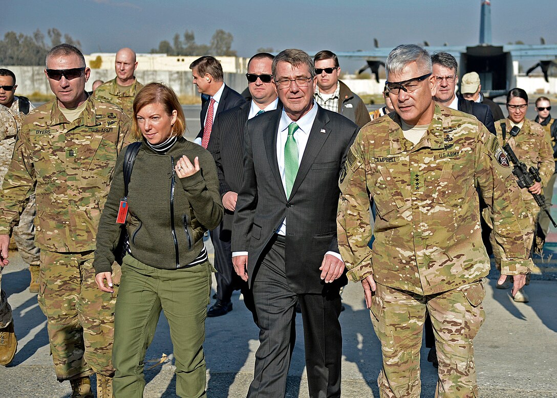 U.S. Army Gen. John F. Campbell walks with U.S. Defense Secretary Ash Carter and Carter’s wife, Stephanie, upon their arrival on Forward Operating Base Fenty in Jalalabad, Afghanistan, Dec. 18, 2015. U.S. Air Force photo by Staff Sgt. Tony Coronado