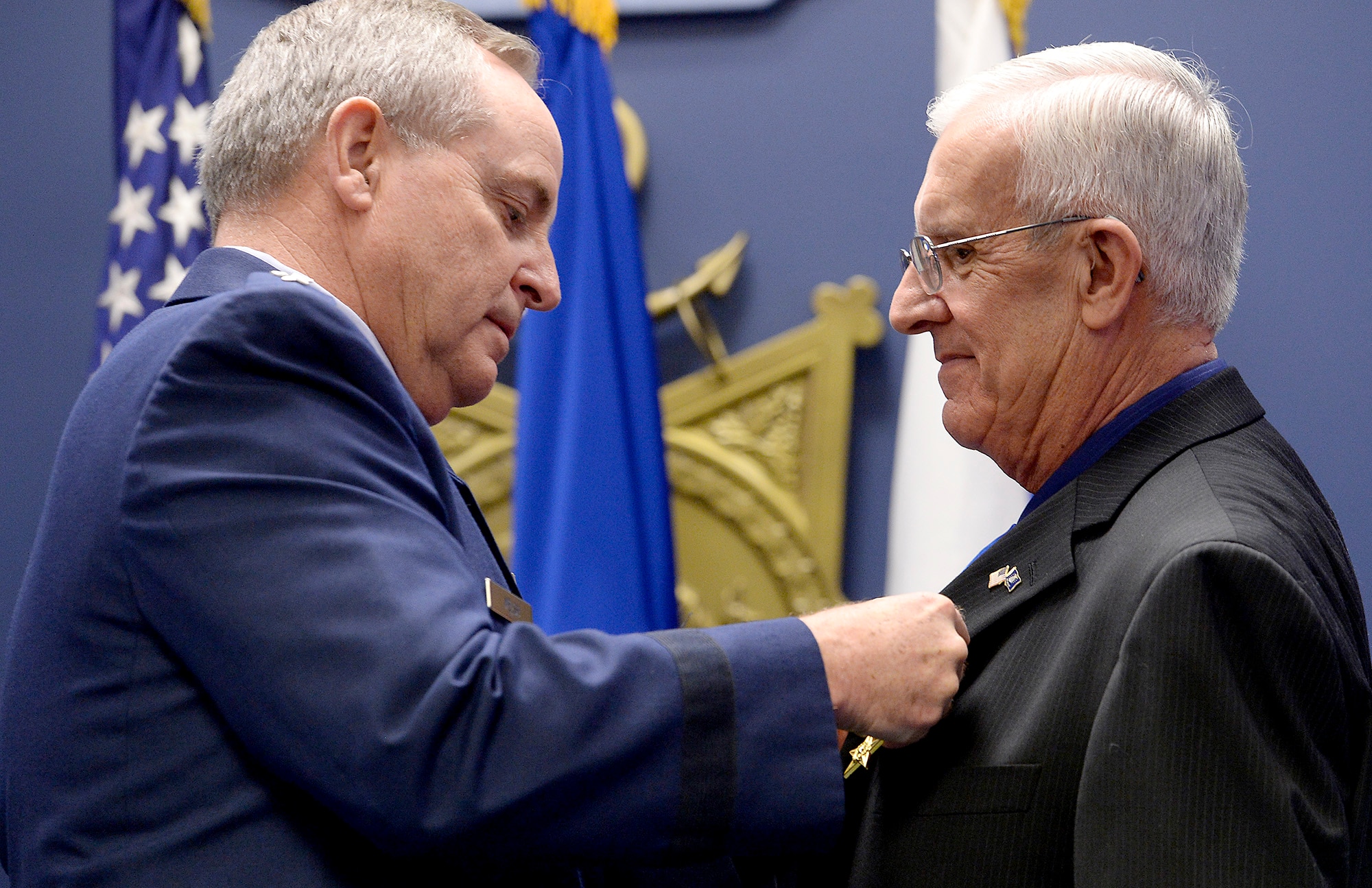 Air Force Chief of Staff Gen. Mark A. Welsh III pins the Silver Star to retired Chief Master Sgt. Ronald W. Brodeur during a ceremony at the Pentagon in Washington D.C., Dec. 17, 2015. Brodeur received the medal for his gallant action in Vietnam. (U.S. Air Force photo/Scott M. Ash)