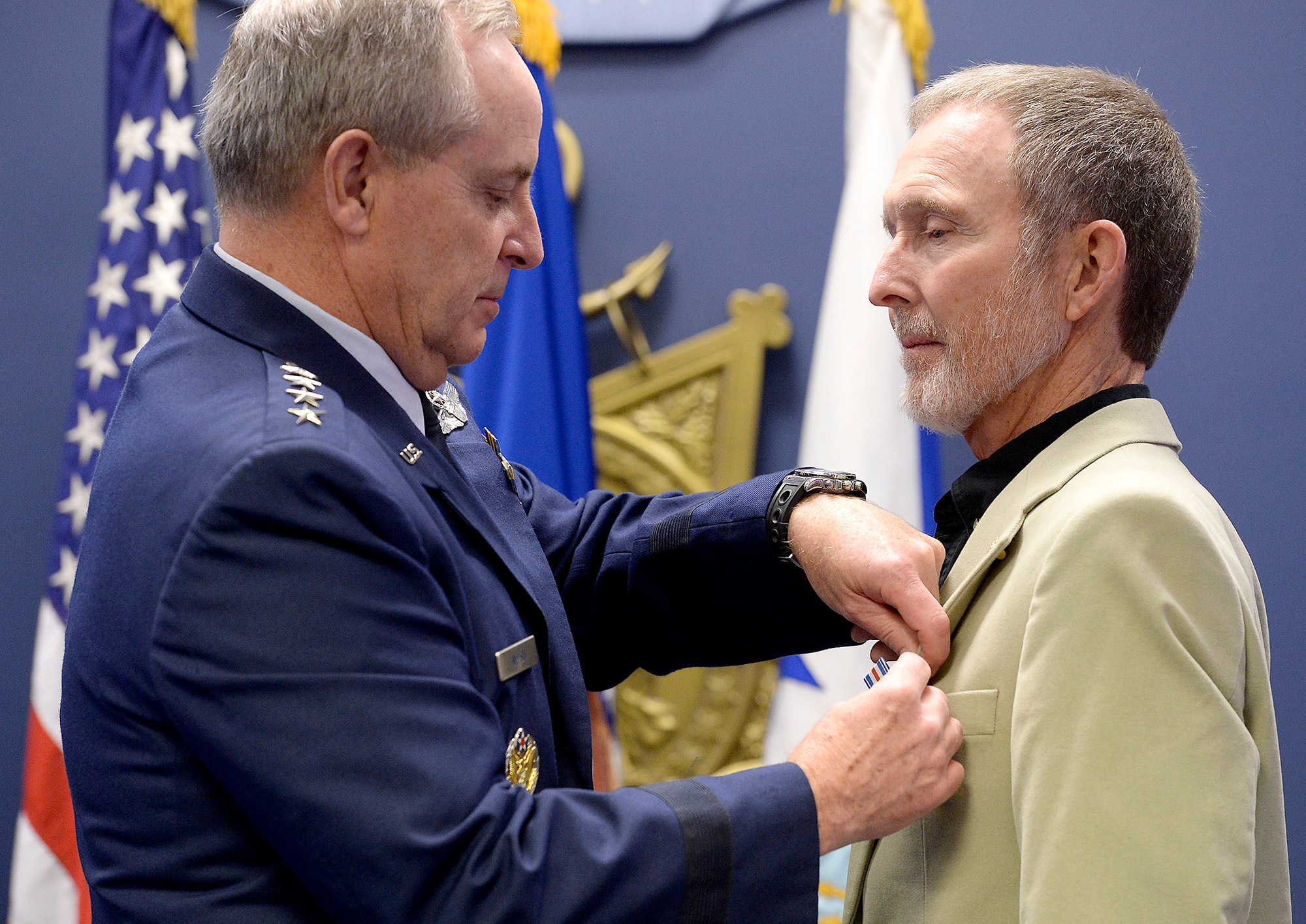 Air Force Chief of Staff Gen. Mark A. Welsh III pins the Silver Star to Eric L. Roberts II during a ceremony at the Pentagon in Washington D.C., Dec. 17, 2015. Roberts received the medal for his gallant action in Vietnam. (U.S. Air Force photo/Scott M. Ash)