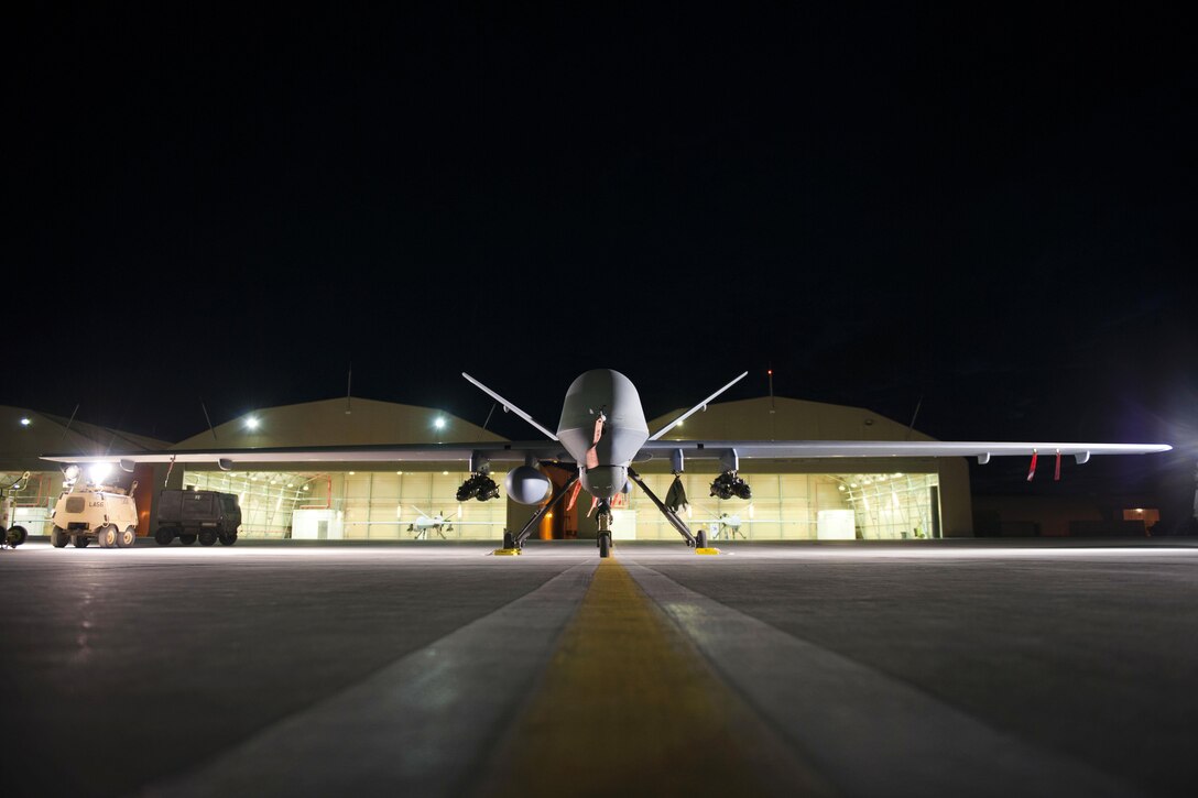 An MQ-9 Reaper equipped with an extended range modification sits on the ramp on Kandahar Airfield, Afghanistan, Dec. 6, 2015. The Reaper is an armed, multimission, medium-altitude, long-endurance remotely piloted aircraft used primarily as an intelligence collection asset and also against dynamic execution targets. The modification allows for 20 to 40 percent additional flight time. U.S. Air Force photo by Tech. Sgt. Robert Cloys