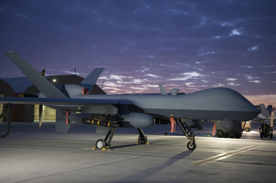 An MQ-9 Reaper equipped with an extended range modification sits on the ramp on Kandahar Airfield, Afghanistan, Dec. 6, 2015. U.S. Air Force photo by Tech. Sgt. Robert Cloys