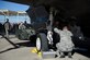 Weapons load crew members from the 61st Aircraft Maintenance Unit load an F-35A Lightning ll during a load crew competition Dec. 18, 2015, at Luke Air Force Base, Ariz. For the first time, the F-35 was used in the competition against the F-16 Fighting Falcon at Luke AFB. (U.S. Air Force photo/Staff Sgt. Staci Miller)