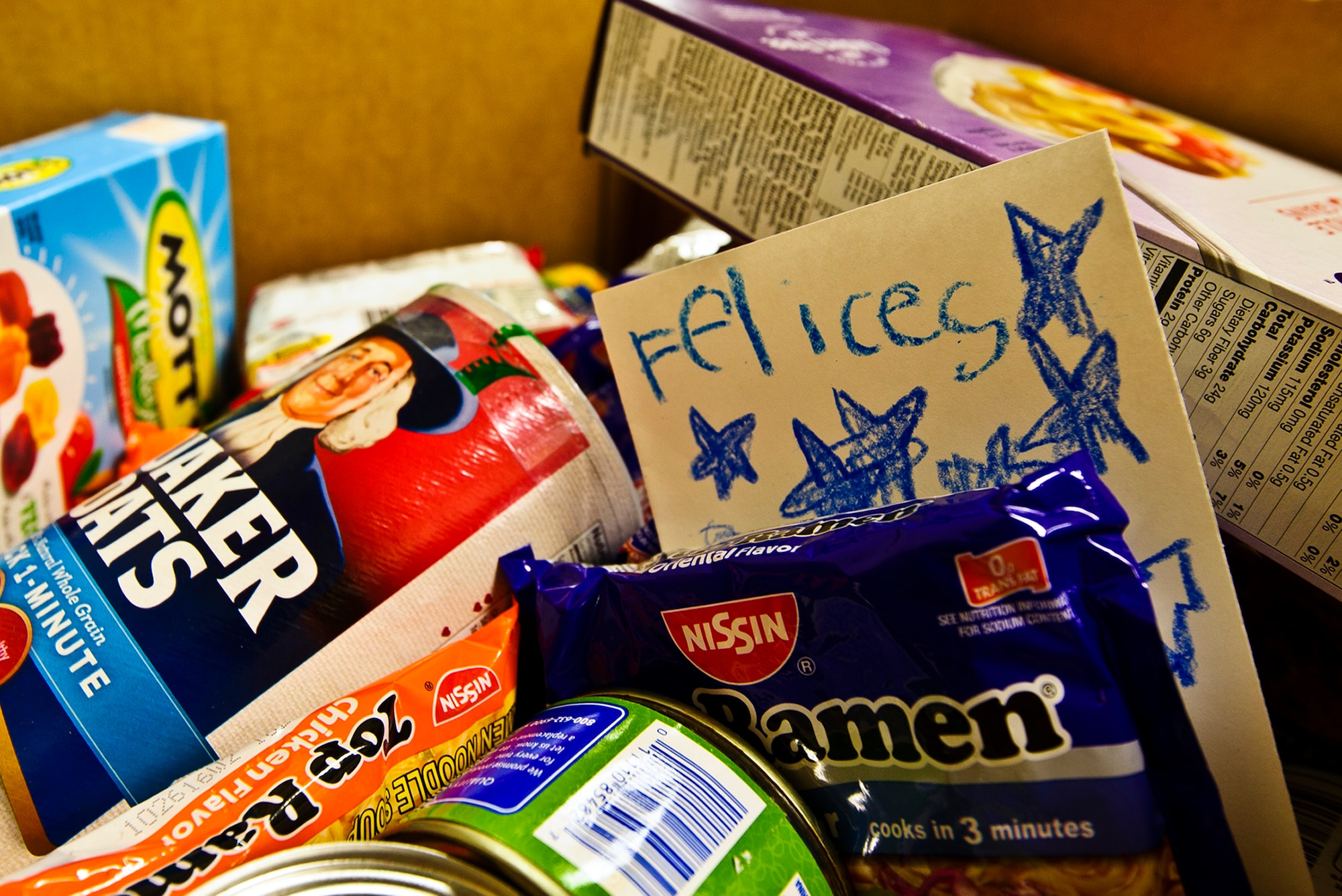 A food box waits to be taken in by various Reserve family homes, Dec. 15, 2015. Food baskets for the December holidays are donated by the Central Pierce County Fire Department, Tacoma, Washington. The department donated 50 of its 450 dinner boxes to the 446th Airlift Wing Care and Share program, run by the 446th Force Support Squadron, Airman & Family Readiness Center here. Food drives are the cornerstone of Care and Share because they support Reserve families, who endure financial stress during the holiday season, said Mr. Carl Supplee, A&FRC director.