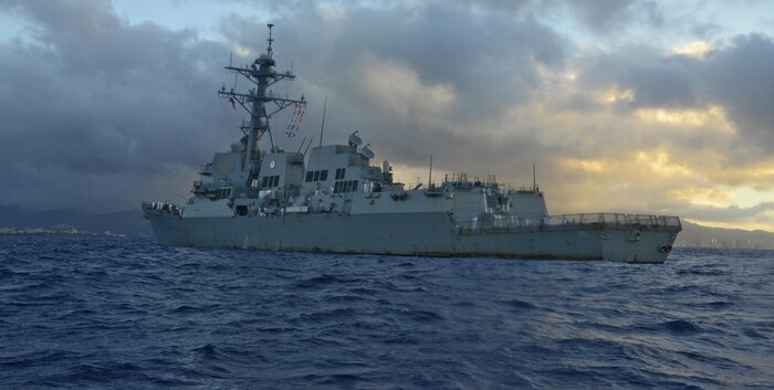 151217-N-DT805-091 PEARL HARBOR (Dec. 17, 2015) The guided-missile destroyer USS Chafee (DDG 90) returns to Joint Base Pearl Harbor-Hickam following an independent deployment to the Western Pacific. Deployed since May, the crew of more than 350 Sailors steamed a total of 42,000 nautical miles across the U.S. 3rd, 4th and 7th Fleet areas of operation. While deployed Chafee conducted various theater security operations and goodwill activities with partner nations.  Chafee also escorted USS George Washington (CVN 73) during a Southern Sea deployment around South America and through the Straits of Magellan before the carrier's return to Norfolk, Va., this month. (U.S. Navy photo by Chief Mass Communication Specialist John M. Hageman/Released)