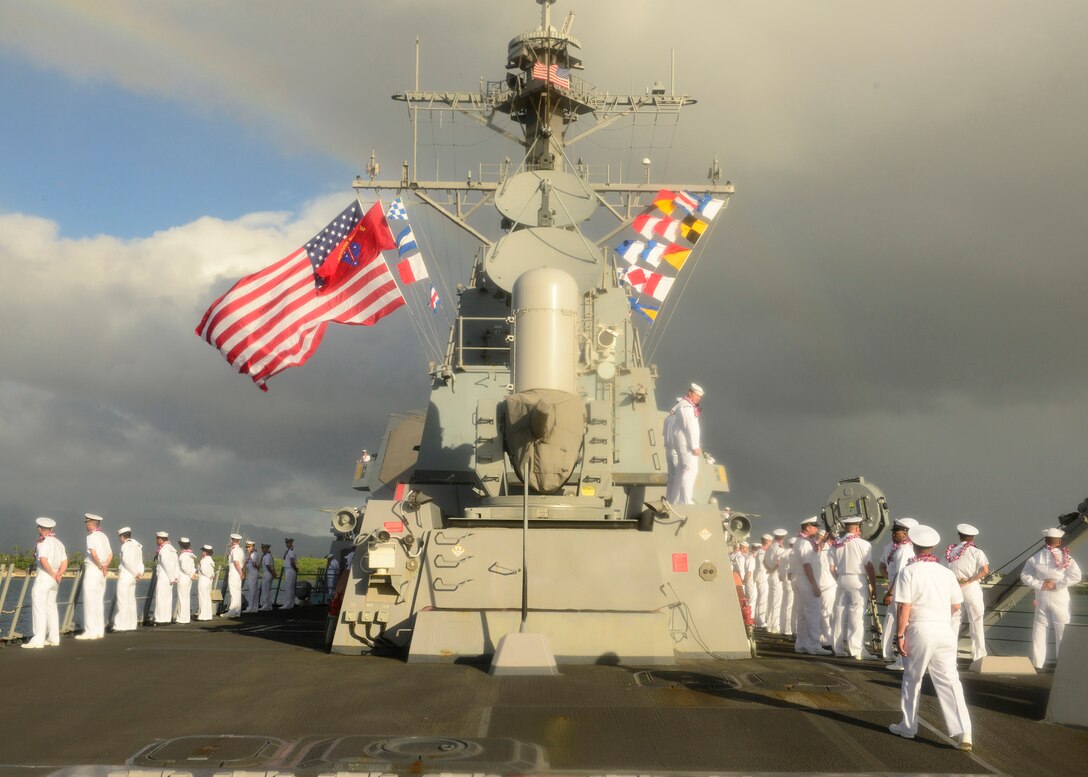 151217-N-DT805-283 PEARL HARBOR (Dec. 17, 2015) Sailors man the rails of the guided-missile destroyer USS Chafee (DDG 90) as it returns to Joint Base Pearl Harbor-Hickam following an independent deployment to the Western Pacific. Deployed since May, the crew of more than 350 Sailors steamed a total of 42,000 nautical miles across the U.S. 3rd, 4th and 7th Fleet areas of operation. While deployed Chafee conducted various theater security operations and goodwill activities with partner nations.  Chafee also escorted USS George Washington (CVN 73) during a Southern Sea deployment around South America and through the Straits of Magellan before the carrier's return to Norfolk, Va., this month. (U.S. Navy photo by Chief Mass Communication Specialist John M. Hageman/Released)