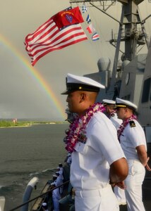 151217-N-DT805-292 PEARL HARBOR (Dec. 17, 2015) Chief Electricians Mate Luis Zamoralazzo mans the rails of the guided-missile destroyer USS Chafee (DDG 90) as it returns to Joint Base Pearl Harbor-Hickam following an independent deployment to the Western Pacific. Deployed since May, the crew of more than 350 Sailors steamed a total of 42,000 nautical miles across the U.S. 3rd, 4th and 7th Fleet areas of operation. While deployed Chafee conducted various theater security operations and goodwill activities with partner nations.  Chafee also escorted USS George Washington (CVN 73) during a Southern Sea deployment around South America and through the Straits of Magellan before the carrier's return to Norfolk, Va., this month. (U.S. Navy photo by Chief Mass Communication Specialist John M. Hageman/Released)