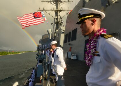 151217-N-DT805-298 PEARL HARBOR (Dec. 17, 2015) Sailors man the rails of the guided-missile destroyer USS Chafee (DDG 90) as it returns to Joint Base Pearl Harbor-Hickam following an independent deployment to the Western Pacific. Deployed since May, the crew of more than 350 Sailors steamed a total of 42,000 nautical miles across the U.S. 3rd, 4th and 7th Fleet areas of operation. While deployed Chafee conducted various theater security operations and goodwill activities with partner nations.  Chafee also escorted USS George Washington (CVN 73) during a Southern Sea deployment around South America and through the Straits of Magellan before the carrier's return to Norfolk, Va., this month. (U.S. Navy photo by Chief Mass Communication Specialist John M. Hageman/Released)