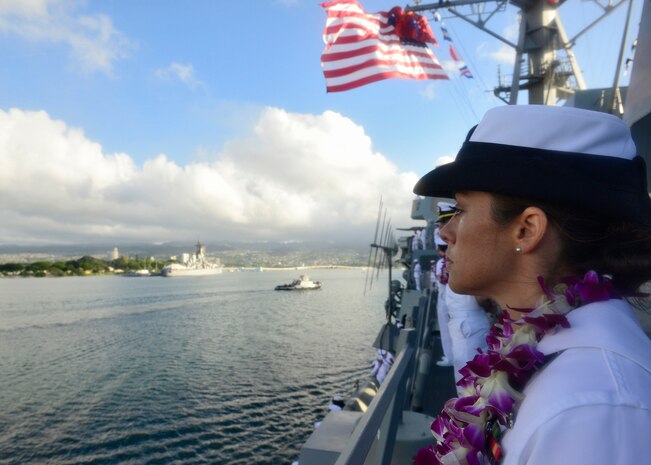 151217-N-DT805-333 PEARL HARBOR (Dec. 17, 2015) Fire Controlman 2nd class Kelli Flanagan mans the rails of the guided-missile destroyer USS Chafee (DDG 90) as it returns to Joint Base Pearl Harbor-Hickam following an independent deployment to the Western Pacific. Deployed since May, the crew of more than 350 Sailors steamed a total of 42,000 nautical miles across the U.S. 3rd, 4th and 7th Fleet areas of operation. While deployed Chafee conducted various theater security operations and goodwill activities with partner nations.  Chafee also escorted USS George Washington (CVN 73) during a Southern Sea deployment around South America and through the Straits of Magellan before the carrier's return to Norfolk, Va., this month. (U.S. Navy photo by Chief Mass Communication Specialist John M. Hageman/Released)