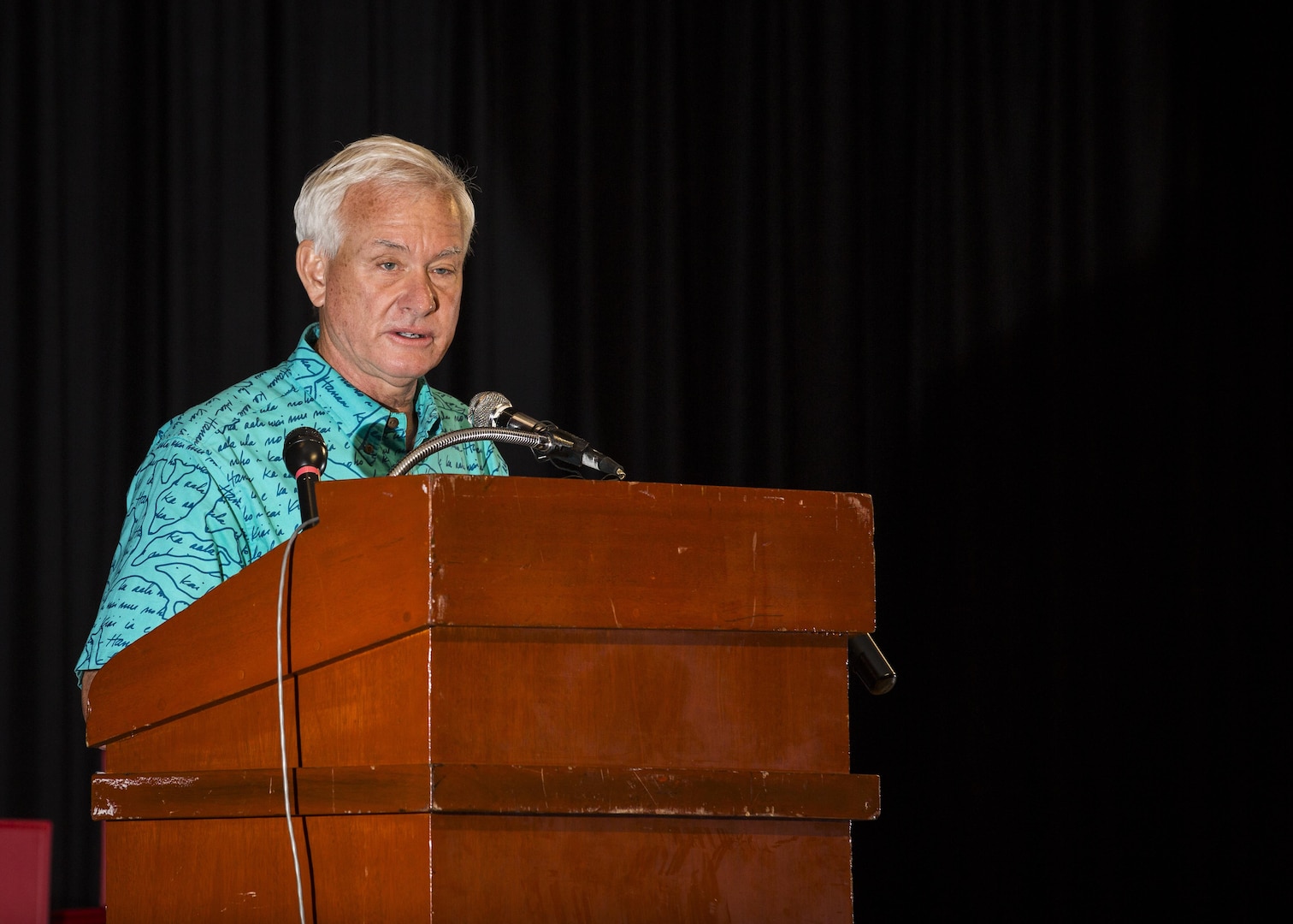Mayor Kirk Caldwell, City & County of Honolulu, speaks during the First Responder Recognition Ceremony at the Neal S. Blaisdell Center, in Honolulu, Dec. 18, 2015. The first responders aided in the rescue and treatment of the crew and passengers of a 15th Marine Expeditionary Unit MV-22 Osprey tilt-rotor aircraft, which suffered a mishap at Marine Corps Training Area Bellows on May 2015. 