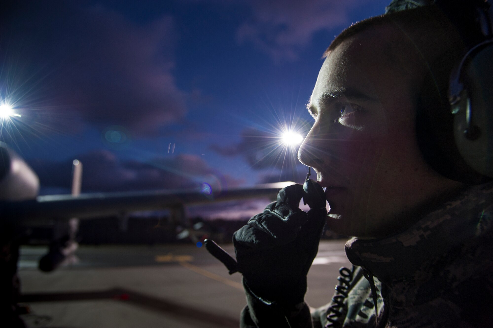 U.S. Air Force Senior Airman Zachery Noordyke, 74th Expeditionary Fighter Squadron crew chief, communicates with an A-10 Thunderbolt II attack aircraft pilot during pre-flight inspections on the flightline, Nov. 11, 2015, at Amari Air Base, Estonia. Noordyke is deployed from the 23d Wing at Moody Air Force Base, Ga., as part of theater security package in support of Operation Atlantic Resolve. (U.S. Air Force photo by Andrea Jenkins/Released)