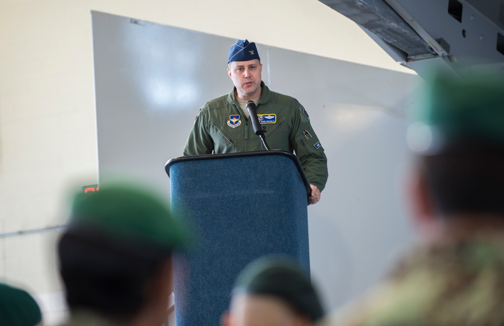 U.S. Air Force Col. John Nichols, 14th Flying Training Wing commander, speaks during the graduation of the first 81st Fighter Squadron’s student pilot class, Dec. 18, 2015, at Moody Air Force Base, Ga. The Afghan air force pilots began their classroom training in February 2015 and launched on their first A-29 Super Tucano training sorties in March 2015. (U.S. Air Force photo by Senior Airman Ceaira Tinsley/Released)