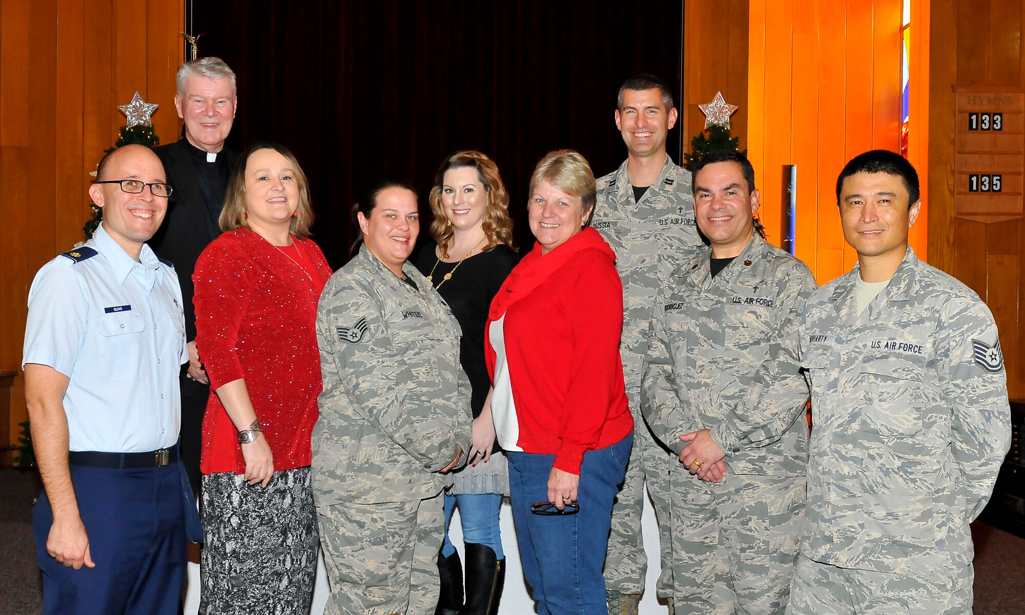 Tyndall’s Chapel Staff stand in the Chapel Sanctuary after their open house on Dec. 11. The open house was held to introduce their staff, showcase their services and foster relationships with the members of Team Tyndall. (U.S. Air Force photo by Senior Airman Alex Echols/Released)