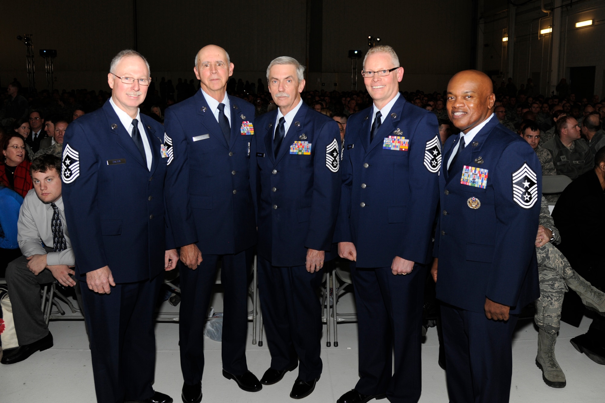 The five most recent command chief master sergeants of the 127th Wing gather at Selfridge Air National Guard Base during the annual awards ceremony at the base, Dec. 5, 2015. Pictured are Chief Master Sgts. (ret) Michael Dalton, Stephen Krajewski and Keith Edwards; and Chief Master Sgts. Robert Dobson and Tony Whitehead. During the ceremony, Whitehead replaced Dobson as the Wing’s current command chief. (U.S. Air National Guard photo by Senior Airman Ryan Zeski)