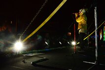 Kira Isabella, Canadian country singer, performs on the Canadian Pacific Holiday Train at the Old Soo Depot Transportation Museum in Minot, N.D., Dec. 15, 2015. The train visits communities in Quebec, New York and southern Ontario before traveling across states in the northeast and Midwest, before returning to Canada for its final stops in Saskatchewan and Alberta. The Holiday Train travels through dozens of communities, raising food and cash donations for North American food banks. (U.S. Air Force photo/Airman 1st Class Matt Rauschnot)