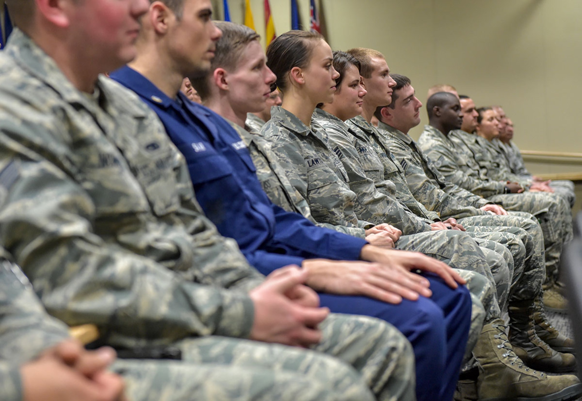 Service members at the Joint Base Elmendorf-Richardson Professional Military Education Center listen to a speaker Dec. 8. The PMEC’s largest Airman Leadership School class ever graduates Friday. (U.S. Air Force photo/Justin Connaher)