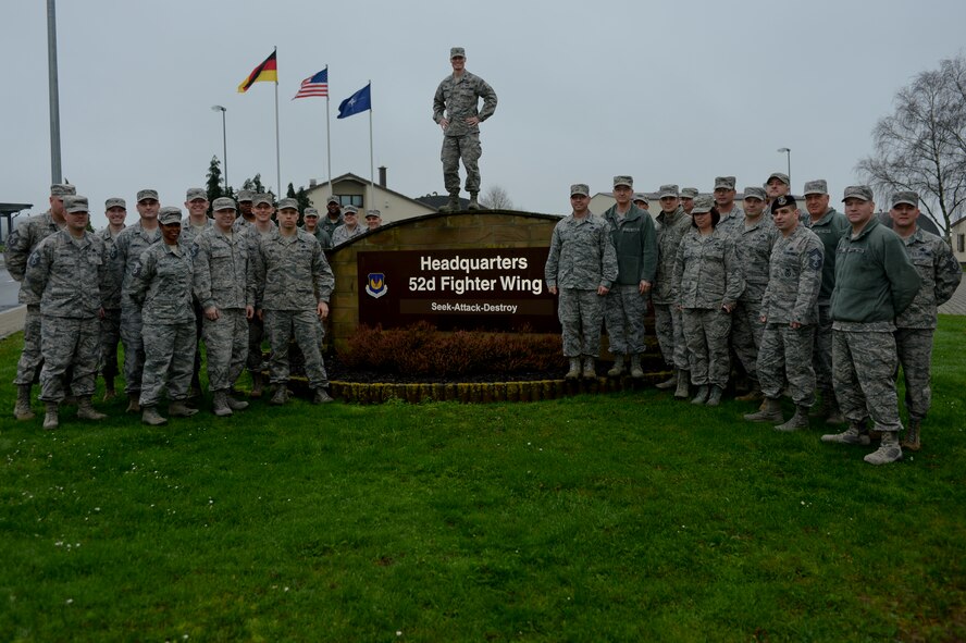 Spangdahlem senior master sergeants selected for promotion stand with the base's chief master sergeants and 52nd Fighter Wing leadership outside wing headquarters at Spangdahlem Air Base, Germany, Dec. 17, 2015. The selected senior master sergeants will later be inducted into the top one percent of the Air Force's enlisted ranks. (U.S. Air Force photo by Staff Sgt. Joe W. McFadden/Released)