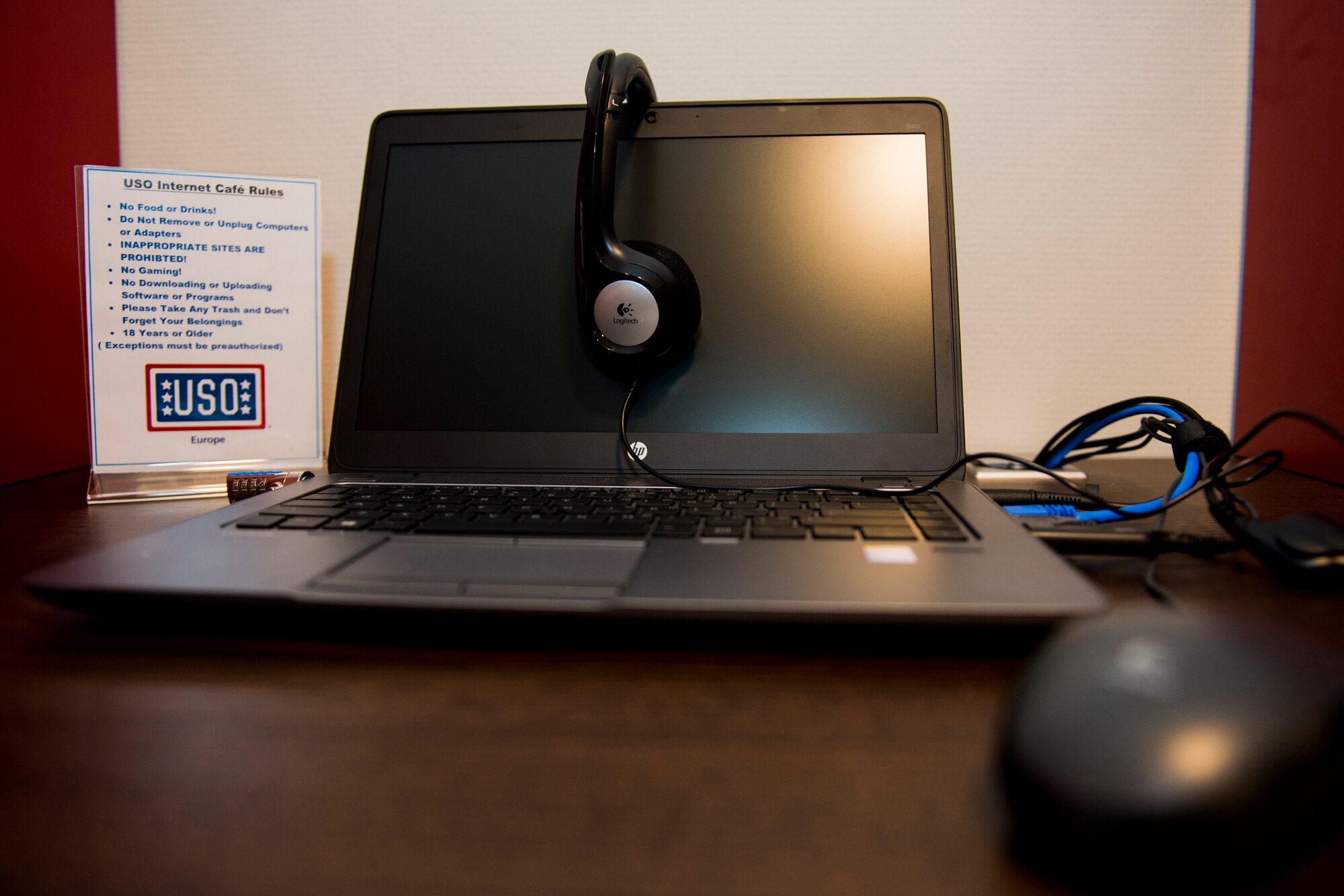 A laptop sits upon a desk at the newly opened USO center at Spangdahlem Air Base, Germany, Dec. 16, 2015. The USO offers access to electronics such as laptops, gaming consoles, televisions and more for Airmen and their families. The USO is located on the first floor of building 126. (U.S. Air Force photo by Airman 1st Class Luke Kitterman/Released)