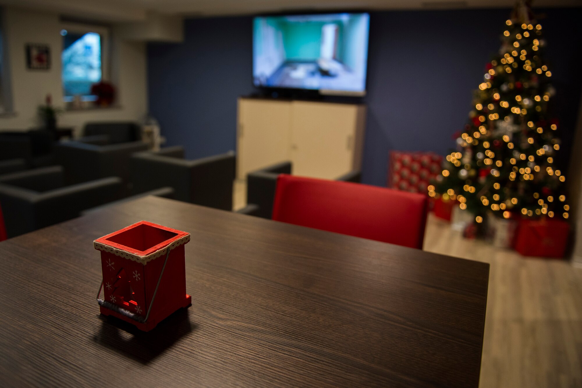 A holiday decoration sits on top of a table in the newly opened United Services Organization center at Spangdahlem Air Base, Germany, Dec. 16, 2015. The USO, located on the first floor of building 126, is accepting volunteers.  (U.S. Air Force photo by Airman 1st Class Luke Kitterman/Released)