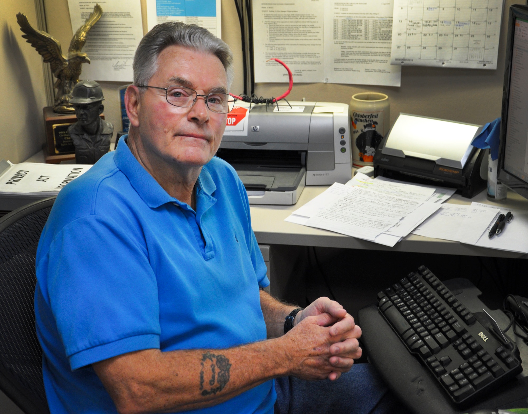Chuck McBay, 53rd Wing facility manager, poses for a photo in his workspace Dec. 17, 2015, at Eglin Air Force Base, Fla. McBay will retire after 52 years of both active-duty and civil service. (U.S. Air Force photo by 1st Lt. Amanda Farr)
