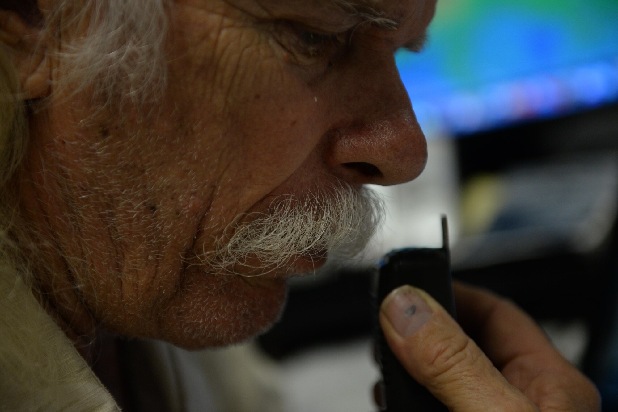 Bruce Best , Pacific program coordinator, communicates with mission planners from the 36th Airlift Squadron,Yokota Air Base, Japan, and locals on the islands of Micronesia during Operation Christmas Drop 2015 on Dec. 10, 2015. Operation Christmas Drop is the Department of Defense's longest running humanitarian mission covering 56 remote islands in Micronesia. This is the first year the Royal Australian Air Force and Japan Air Self-Defense Force have participated in the drops. (U.S. Air Force photo by Tech. Sgt. Melissa K. Mekpongsatorn)