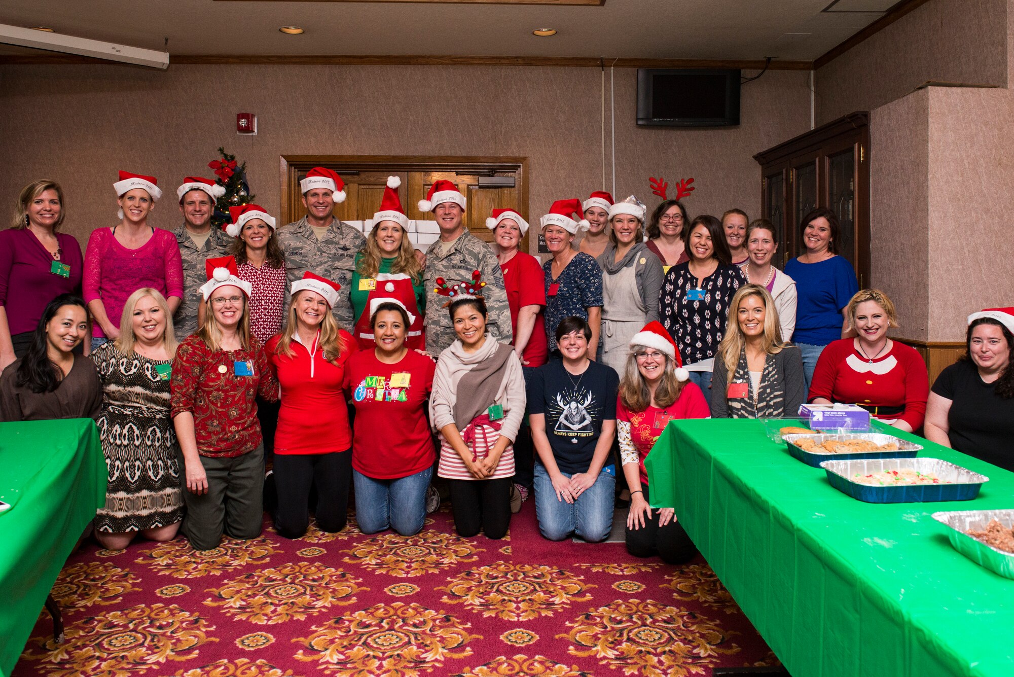 Volunteers boxed, baked or delivered more than 30,000 cookies during the holiday cookie drive, Dec. 14, 2015, at Kadena Air Base, Japan. The holiday cookie drive is an annual event coordinated entirely by volunteers. Each year, thousands of cookies are donated and packaged for delivery to the single service members living in dormitories on Kadena. (U.S. Air Force photo by Senior Airman Omari Bernard)