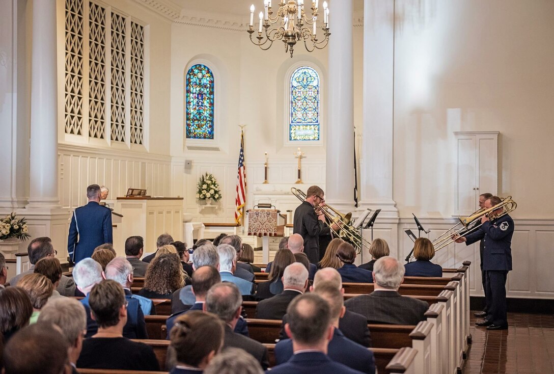 The Air Force Band recently honored a dear colleague and former member at his internment service and ceremony at Arlington National Cemetery.  Senior Master Sgt. Chris Matten's chapel service was standing room only, reminding us of the significant impact of his life and 28 years of service to this nation.  Pictured are some of his former trombone section mates, dedicating a final performance in his memory.  (U.S. Air Force Photo/released)