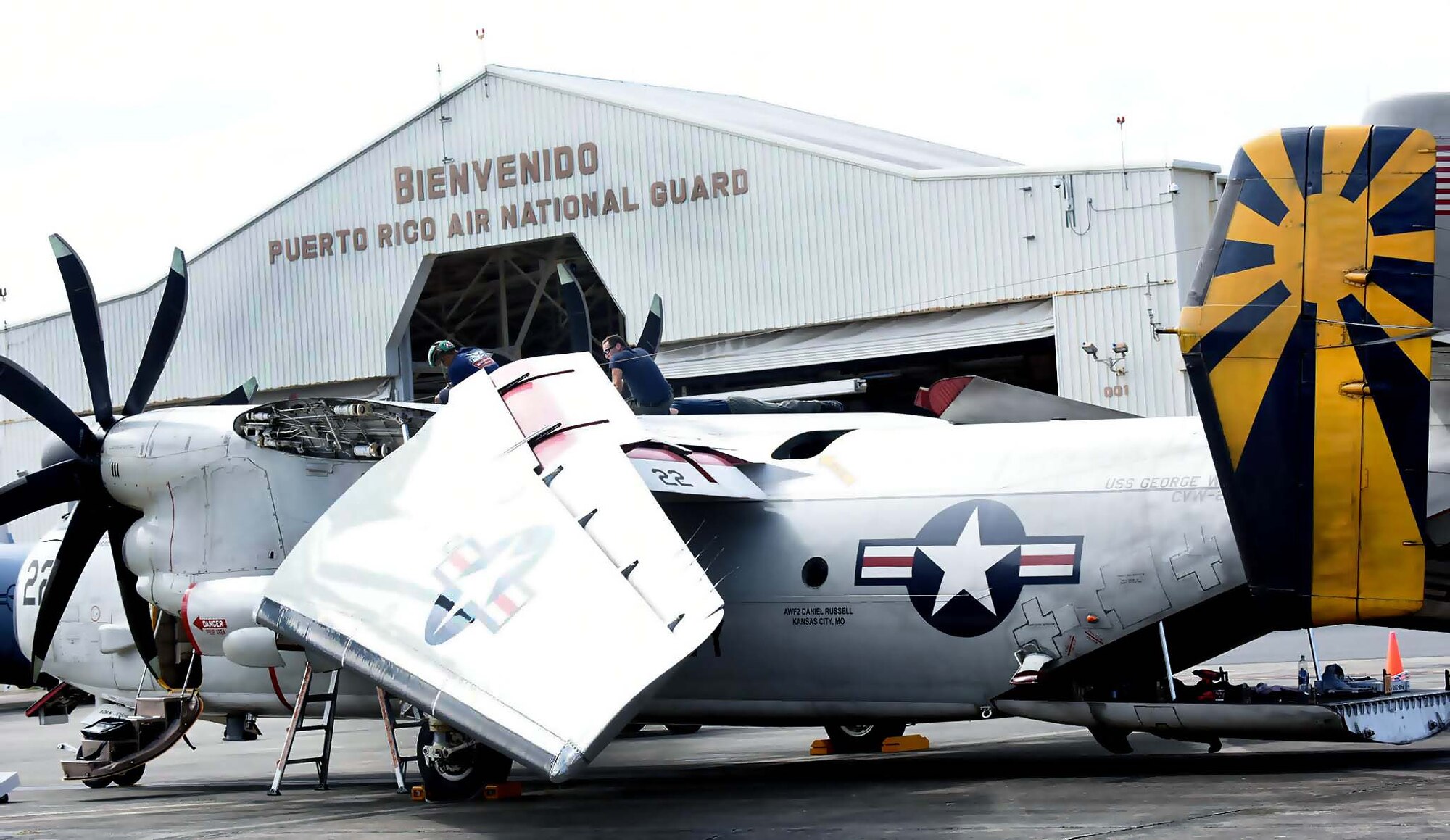The 156th Airlift Wing, provides logistical and maintenance support to the Navy on Puerto Rico Air National Guard Base Muñiz during the week of Dec 5 thru 11, 2015. Two Navy C-2 cargo planes flew in from the USS George Washington Aircraft Carrier to drop off navy personnel, and pick up pre-ordered supplies and equipment for the vessel. The mission is to provide logistical support for the vessel’s journey from San Diego, California to South America, ending its last leg in Norfolk, Virginia. (U.S. Air National Guard photo by Tech Sgt. Efrain Sanchez)
