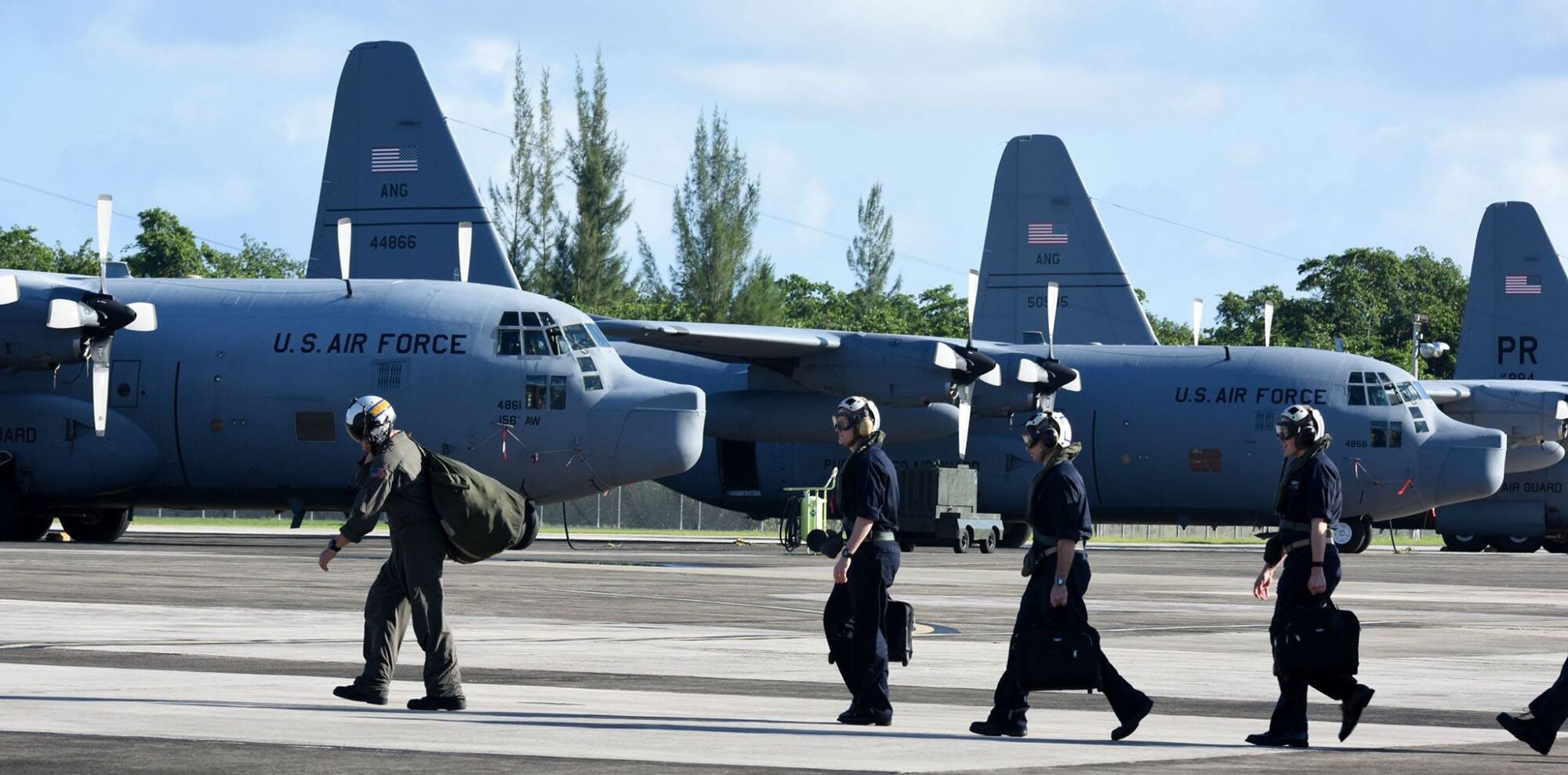 The 156th Airlift Wing, provides logistical and maintenance support to the Navy on Puerto Rico Air National Guard Base Muñiz during the week of Dec 5 thru 11, 2015. Two Navy C-2 cargo planes flew in from the USS George Washington Aircraft Carrier to drop off navy personnel, and pick up pre-ordered supplies and equipment for the vessel. The mission is to provide logistical support for the vessel’s journey from San Diego, California to South America, ending its last leg in Norfolk, Virginia. (U.S. Air National Guard photo by Tech Sgt. Efrain Sanchez)
