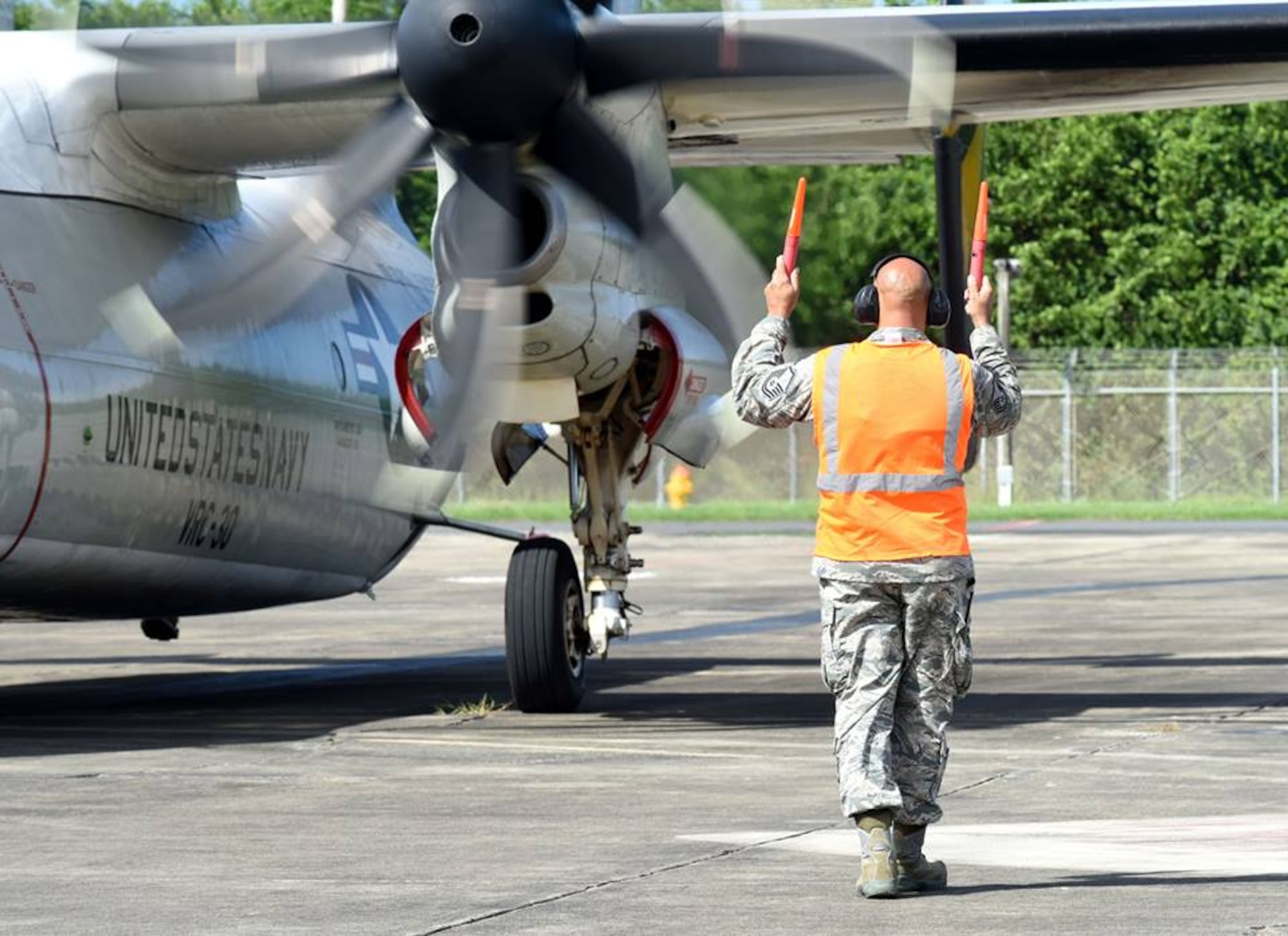 The 156th Airlift Wing, provides logistical and maintenance support to the Navy on Puerto Rico Air National Guard Base Muñiz during the week of Dec 5 thru 11, 2015. Two Navy C-2 cargo planes flew in from the USS George Washington Aircraft Carrier to drop off navy personnel, and pick up pre-ordered supplies and equipment for the vessel. The mission is to provide logistical support for the vessel’s journey from San Diego, California to South America, ending its last leg in Norfolk, Virginia. (U.S. Air National Guard photo by Tech Sgt. Efrain Sanchez)
