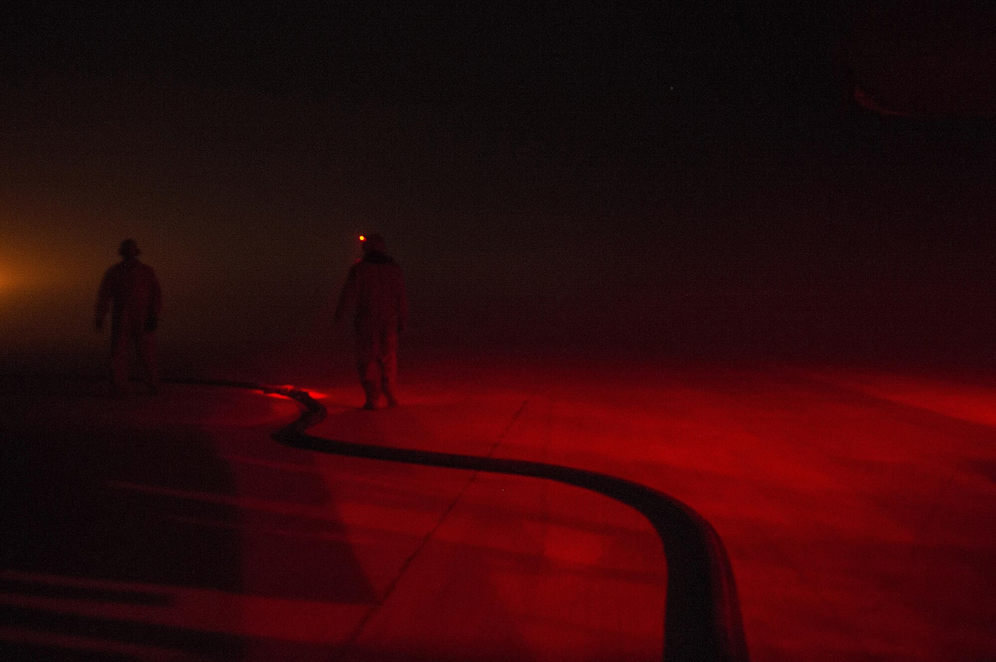 U.S. Air Force Airmen check fuel lines for leaks as fuel is pumped to storage units on a coalition base in Iraq in support of Operation Inherent Resolve, Dec. 16, 2015. OIR is the coalition intervention against the Islamic State of Iraq and the Levant. (U.S. Air Force photo by Tech. Sgt. Nathan Lipscomb)