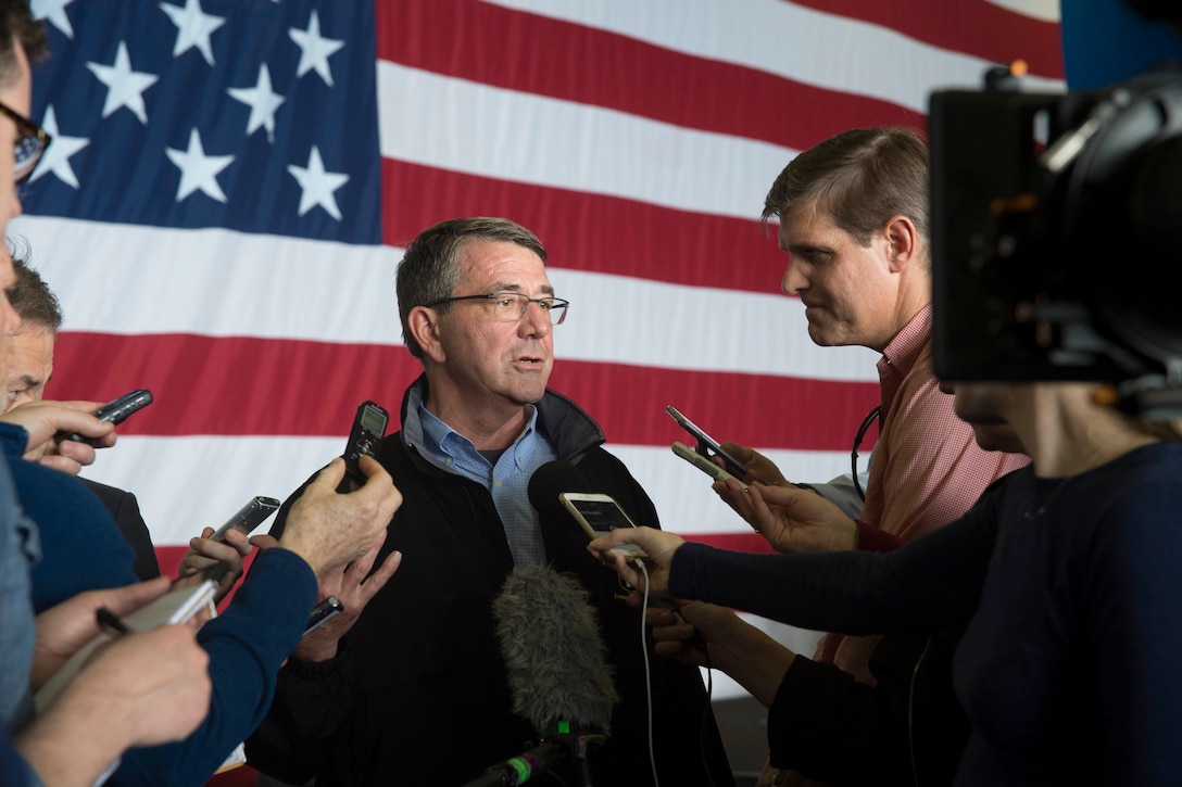 U.S. Defense Secretary Ash Carter speaks with media during a press conference aboard the amphibious assault ship USS Kearsarge in the Arabian Gulf, Dec. 19, 2015. U.S. Navy photo by Petty Officer 3rd Class Tyler Preston