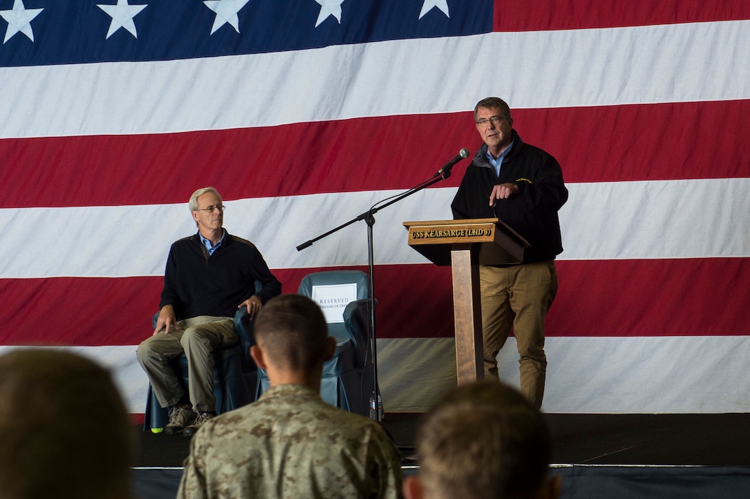 U.S. Defense Secretary Ash Carter addresses sailors and Marines during an all-hands call in the hangar bay aboard the amphibious assault ship USS Kearsarge in the Arabian Gulf, Dec. 19, 2015. U.S. Navy photo by Petty Officer 2nd Class Travis DiPerna