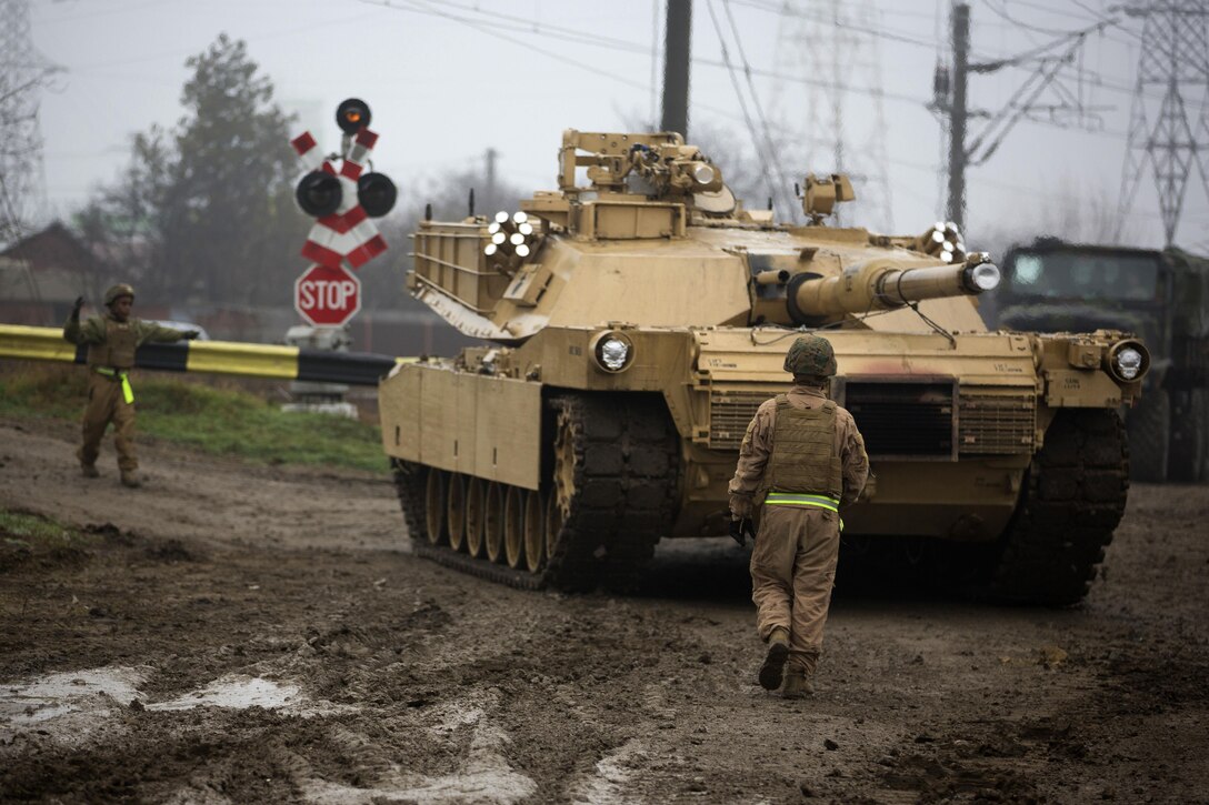 U.S. Marines unload heavy equipment at Bethesda rail station in Romania, Dec. 6, 2015. The Marines, assigned to Combined Arms Company, Black Sea Rotational Force, brought the equipment from Novo Selo Training Area in Bulgaria to participate in Platinum Lynx 16-2, a multinational exercise designed to strengthen combat readiness while building and maintaining strong relationships with allied and partner nations. U.S. Marine Corps photo by Lance Cpl. Melanye E. Martinez