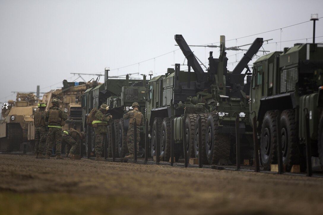 U.S. Marine Corps tanks, artillery, light-armored vehicles and heavy equipment arrive at Bethesda rail station in Romania, Dec. 6, 2015. U.S. Marine Corps photo by Lance Cpl. Melanye E. Martinez 