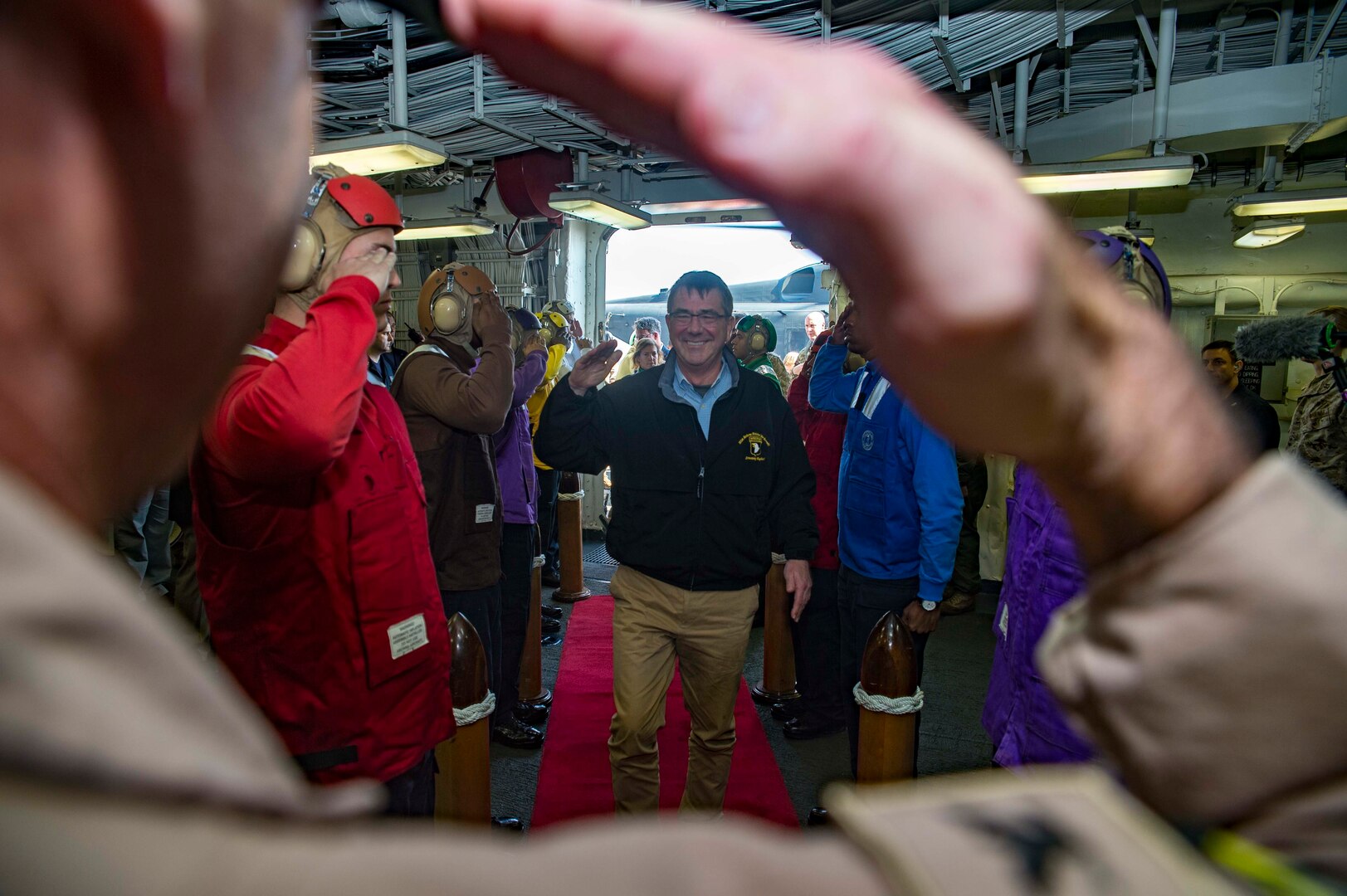 U.S. Defense Secretary Ash Carter arrives aboard the amphibious assault ship USS Kearsarge in the Arabian Gulf, Dec. 19, 2015. Carter has been on a weeklong middle east trip. The Kearsarge is the flagship for the Kearsarge Amphibious Ready Group and, with the embarked 26th Marine Expeditionary Unit, is deployed in support of maritime security operations and theater security cooperation efforts in the U.S. 5th Fleet area of operations. U.S. Navy photo by Petty Officer 3rd Class Tyler Preston
