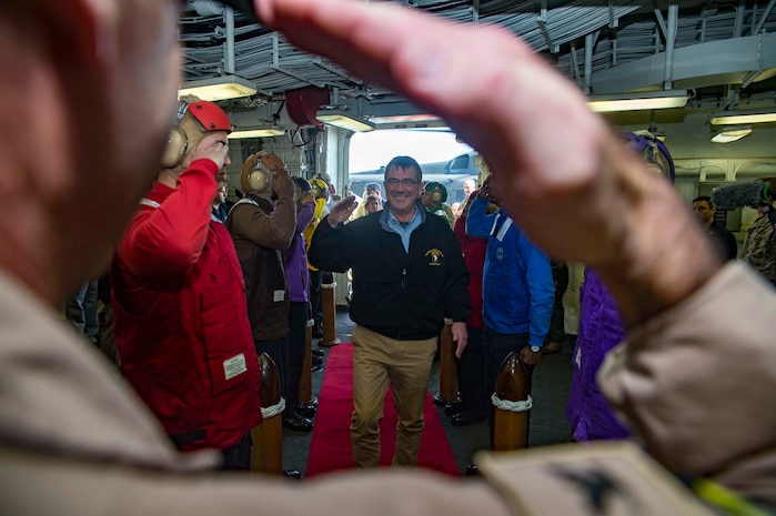 U.S. Defense Secretary Ash Carter arrives aboard the amphibious assault ship USS Kearsarge in the Arabian Gulf, Dec. 19, 2015. Carter has been on a weeklong middle east trip. The Kearsarge is the flagship for the Kearsarge Amphibious Ready Group and, with the embarked 26th Marine Expeditionary Unit, is deployed in support of maritime security operations and theater security cooperation efforts in the U.S. 5th Fleet area of operations. U.S. Navy photo by Petty Officer 3rd Class Tyler Preston